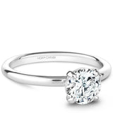 A Noam Carver white gold engagement ring with a round centerpiece.