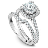 A Noam Carver white gold engagement ring with a cushion halo and 42 diamonds.