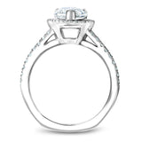 A Noam Carver white gold engagement ring with a pear halo, a split band and 63 diamonds.