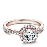 A Noam Carver rose gold engagement ring with a round halo and 36 diamonds.