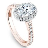 A Noam Carver rose gold engagement ring with 38 diamonds, an oval centerpiece and a white gold halo. 