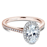 A Noam Carver rose gold engagement ring with 38 diamonds, an oval centerpiece and a white gold halo. 