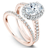 A Noam Carver rose gold engagement ring with 38 diamonds, an oval centerpiece and a white gold halo. 