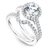 A Noam Carverwhite gold engagement ring with a round center diamond, a halo and 52 diamonds.