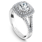 A Noam Carver white gold engagement ring with a round cut diamond in a double cushion halo, a split band and 80 diamonds.