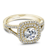 A Noam Carver yellow gold engagement ring with a round cut diamond in a double cushion halo, a split band and 80 diamonds.