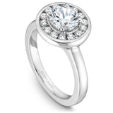A Noam Carver white gold engagement ring with 14 diamonds on a round halo.