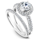 A Noam Carver white gold engagement ring with a round center stone on a halo and 68 diamonds.