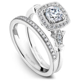 A Noam Carver white gold engagement ring with a cushion cut center stone, a halo and 26 diamonds.