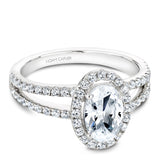 A Noam Carver white gold engagement ring with a halo and a split band encrusted with 74 diamonds.