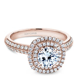 A Noam Carver rose gold engagement ring with a cushion halo and 94 diamonds.