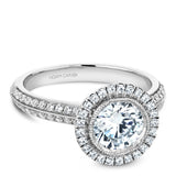 A Noam Carver white gold engagement ring with 71 diamonds and a round halo.