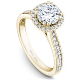 A Noam Carver yellow gold engagement ring with a round halo, 42 diamonds and milgrain detailing on a band.