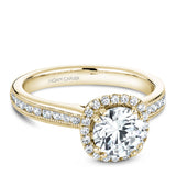 A Noam Carver yellow gold engagement ring with a round halo, 42 diamonds and milgrain detailing on a band.