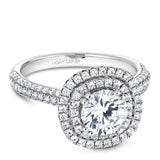 A Noam Carver white gold engagement ring with a cushion halo and 130 diamonds.