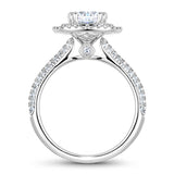 A Noam Carver white gold engagement ring with a cushion halo and 130 diamonds.