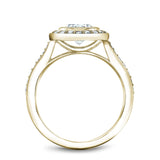 A Noam Carver yellow gold engagement ring with a round halo and 32 diamonds.