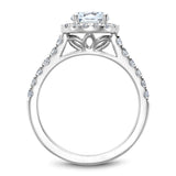 A Noam Carver white gold engagement ring with 28 diamonds and a round halo.