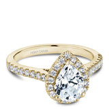A Noam Carver yellow gold engagement ring with a pearhalo and 33 diamonds.