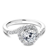 A Noam Carver white gold engagement ring with a round halo and 32 diamonds.