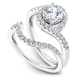 A Noam Carver white gold engagement ring with a round halo and 32 diamonds.
