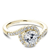 A Noam Carver yellow gold engagement ring with a round halo and 32 diamonds.