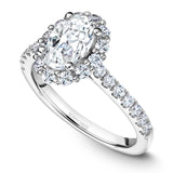 A Noam Carver white gold engagement ring with an oval halo and 26 diamonds.