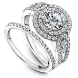 A Noam Carver white gold engagement ring with a round halo and 74 diamonds.