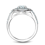 A Noam Carver white gold engagement ring with a round halo and 74 diamonds.