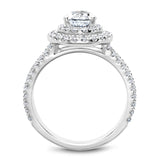 A Noam Carver white gold engagement ring with a pear halo and 84 diamonds.