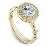 A Noam Carver yellow gold engagement ring with 26 diamonds.