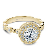 A Noam Carver yellow gold engagement ring with 26 diamonds.