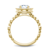 A Noam Carver yellow gold engagement ring with 26 diamonds.