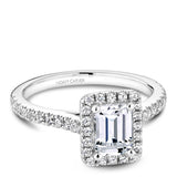 A Noam Carver white gold engagement ring with an emerald halo and 40 diamonds.