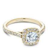 A Noam Carver yellow gold engagement ring with a cushion halo and 36 diamonds.