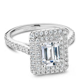 A Noam Carver white gold engagement ring with an emerald double halo and 72 diamonds.