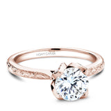 A Noam Carver engraved rose gold engagement ring with 52 diamonds on a band and a floral setting.