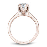 A Noam Carver engraved rose gold engagement ring with 52 diamonds on a band and a floral setting.
