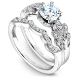 A Noam Carver white gold floral engagement ring with a round centerpiece and 34 round diamonds on a band.