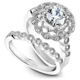 A Noam Carver white gold engagement ring with a floral halo and 18 round diamonds.