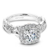 A Noam Carver white gold engagement ring with a cushion halo, 24 round diamonds and a detailed floral band. 