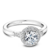 A Noam Carver white gold engagement ring with rose gold floral accents,  a round center stone, a halo and 24 diamonds.