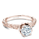 A Noam Carver rose gold engagement ring with a round centerpiece, 2 diamonds on a setting and a floral band.