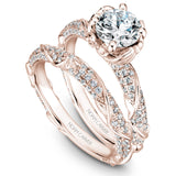A Noam Carver rose gold engagement ring with a round centerpiece and a floral band dazzled with 100 diamonds.