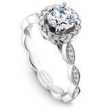 A Noam Carver white gold engagement ring with rose gold accents, a round centerpiece and 34 diamonds on a floral band.