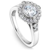 A Noam Carver white gold engagement ring with 20 round diamonds.