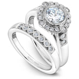 A Noam Carver white gold engagement ring with 20 round diamonds.