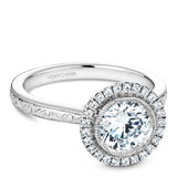 A Noam Carver engraved white gold engagement ring with a round centerpiece on a floral halo and 25 diamonds.