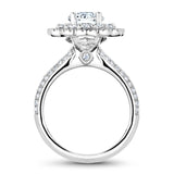 A Noam Carver white gold engagement ring with a floral halo and 94 round diamonds.