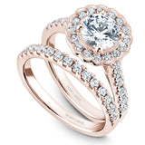 A Noam Carver rose gold engagement ring with a floral halo and 34 diamonds.